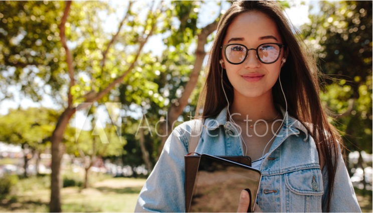 A girl with a notebook.